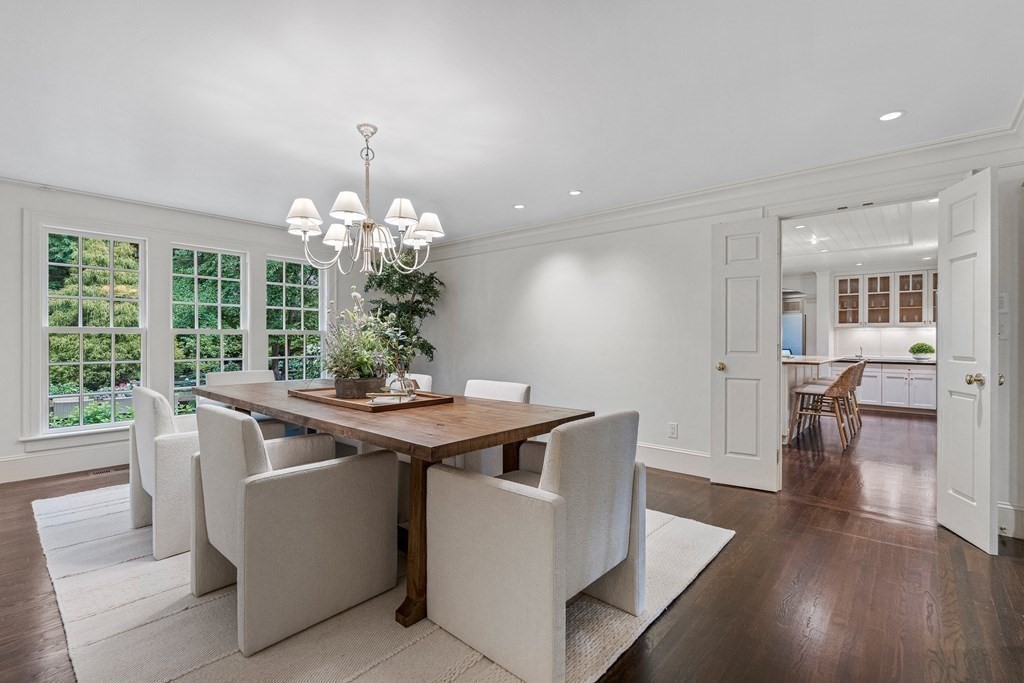211 Meadowbrook Road Weston, MA 02493 - Photo 11 of 41 a view of a dining room with furniture window and wooden floor