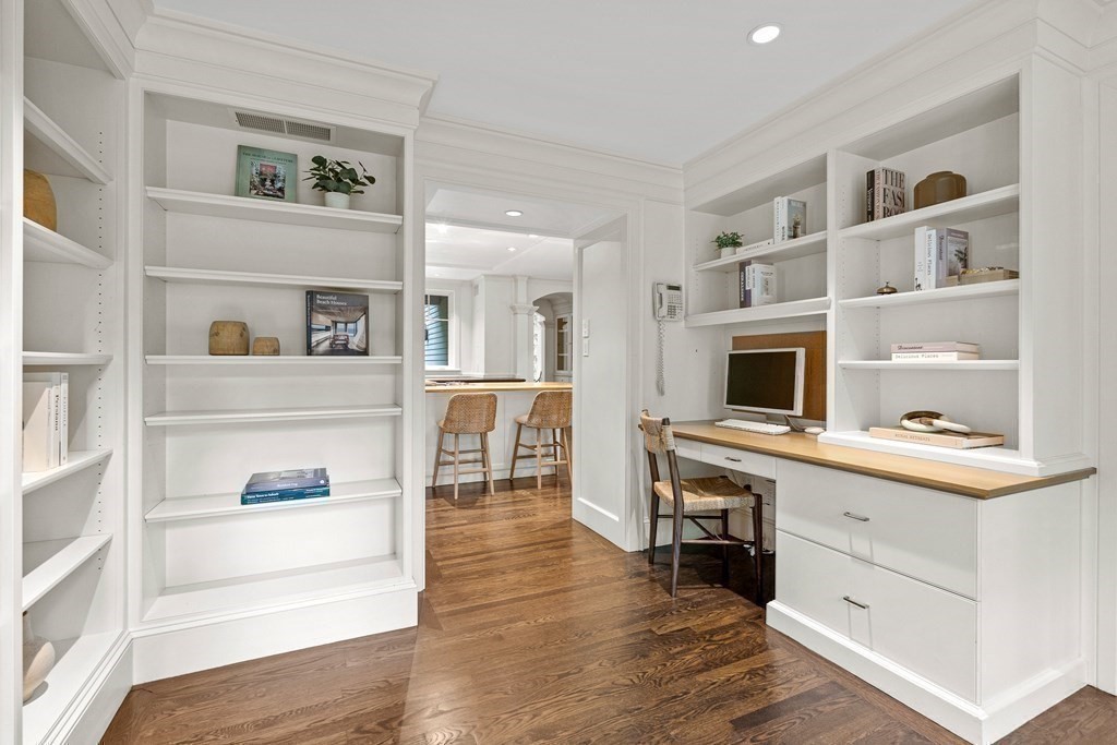 211 Meadowbrook Road Weston, MA 02493 - Photo 17 of 41 a workspace with furniture and wooden floor