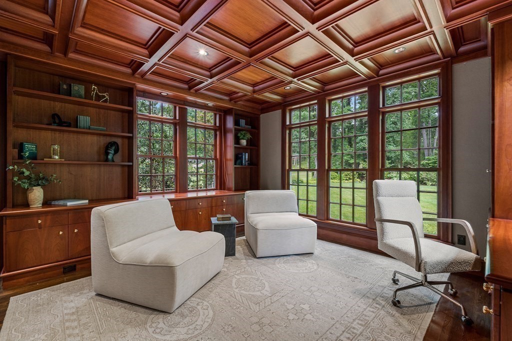 211 Meadowbrook Road Weston, MA 02493 - Photo 23 of 41 a living room with furniture a ceiling fan and a glass door