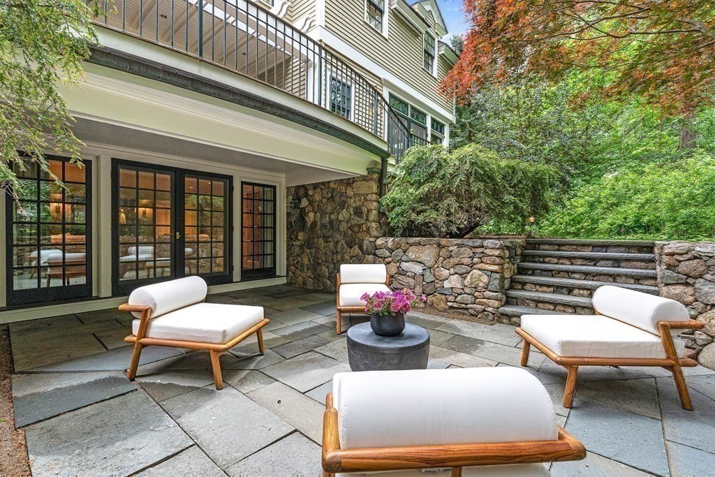 211 Meadowbrook Road Weston, MA 02493 - Photo 36 of 41 a view of a patio with couple of chairs and a table