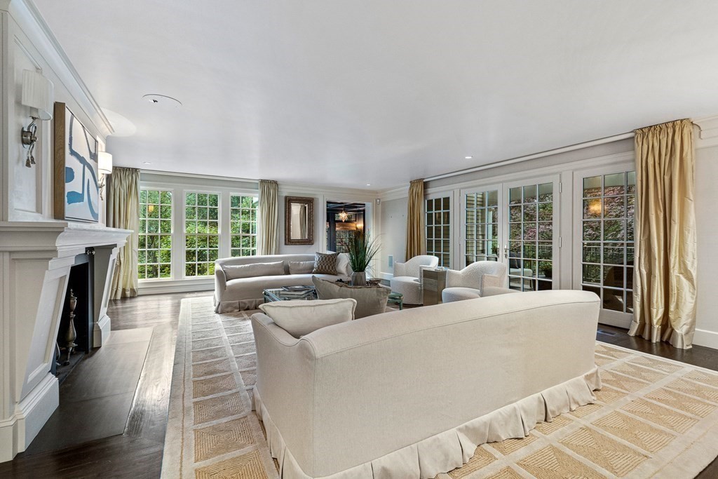211 Meadowbrook Road Weston, MA 02493 - Photo 6 of 41 a living room with fireplace furniture and a large window
