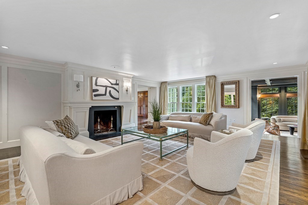 211 Meadowbrook Road Weston, MA 02493 - Photo 7 of 41 a living room with furniture and a fireplace