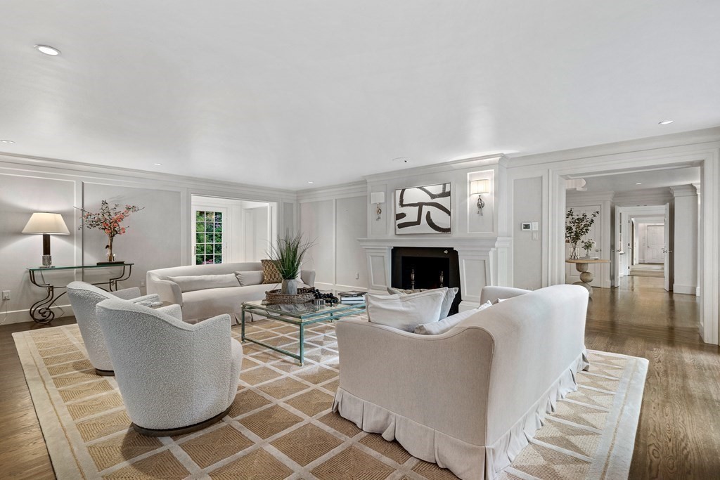 211 Meadowbrook Road Weston, MA 02493 - Photo 8 of 41 a living room with furniture a fireplace and a window