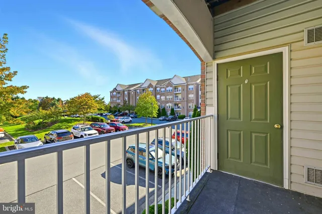 a view of a street from a balcony