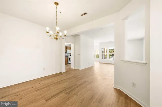 a view of a livingroom with wooden floor