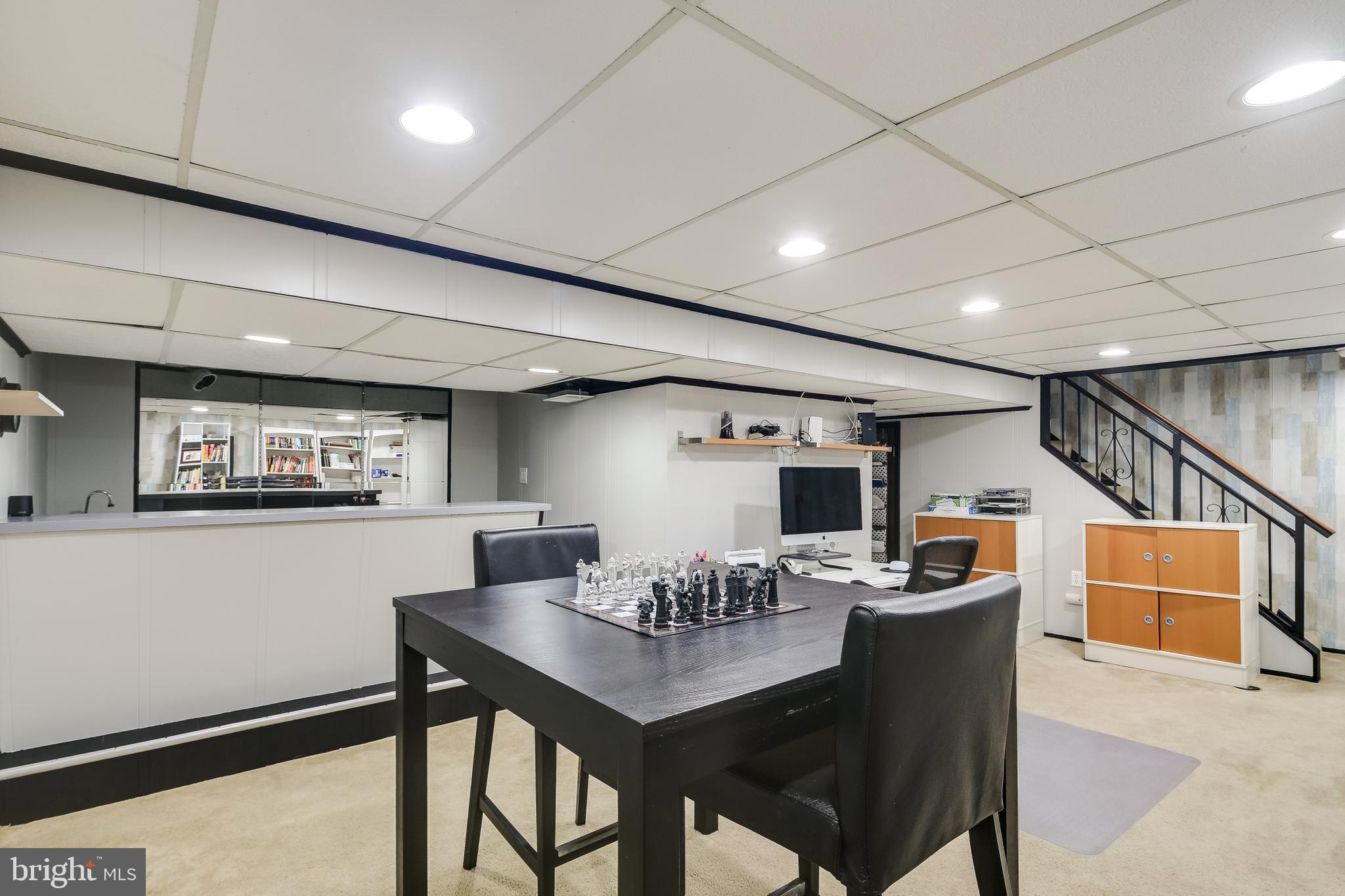 9401 Mellenbrook Road Columbia, MD 21045 - Photo 18 of 29 Finished basement complete with bar