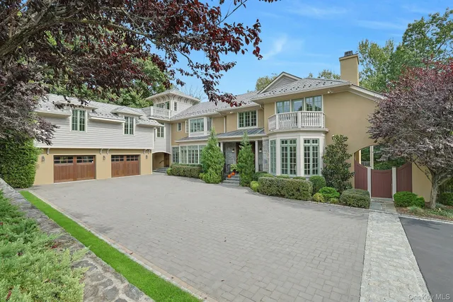 front view of a house with a garden