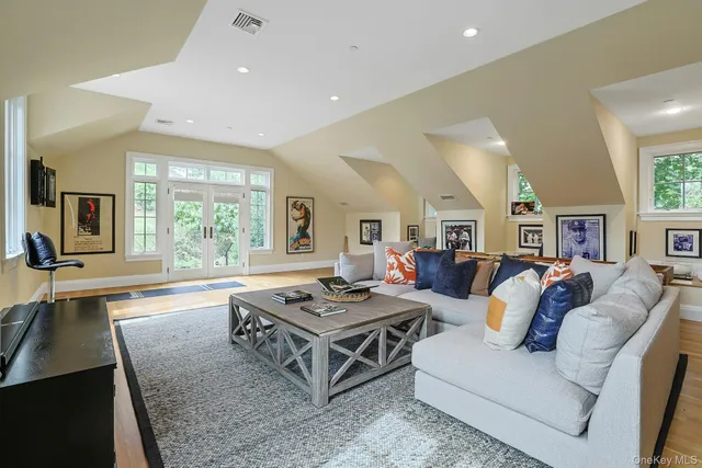 a view of a table and chairs on the roof deck