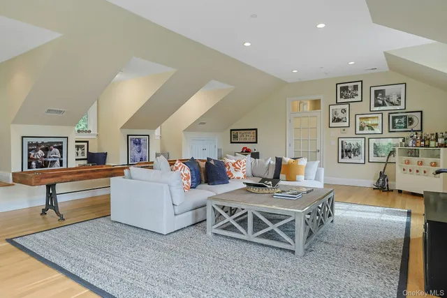 a balcony with furniture and a porch
