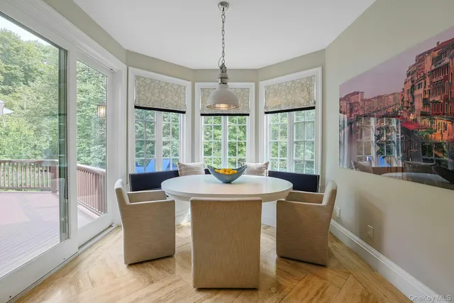 a workspace with furniture and a window