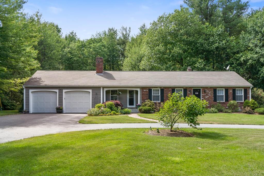 144 Worcester Road Princeton, MA 01541 - Photo 1 of 36 a front view of a house with a yard and potted plants