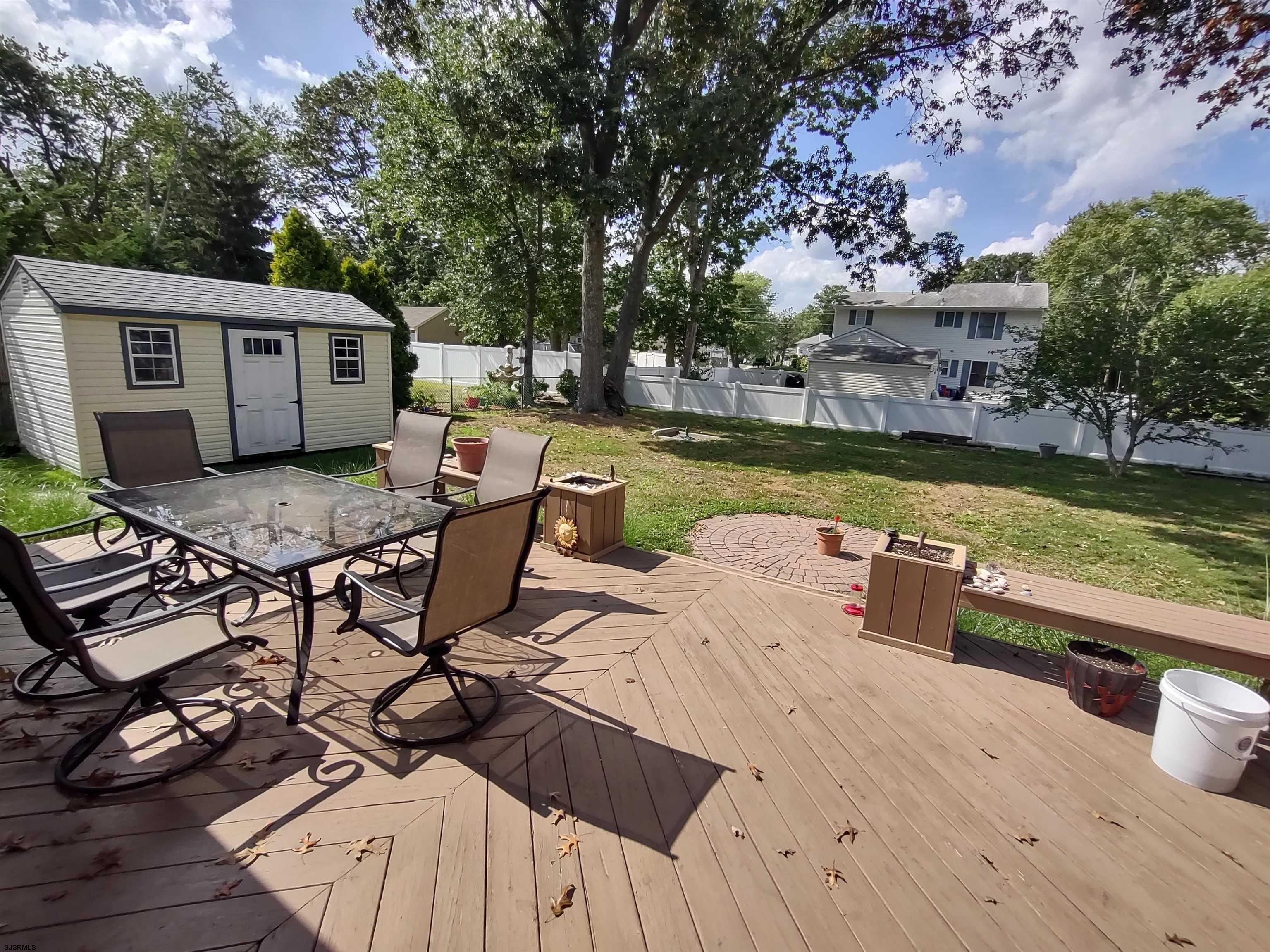12 Osborne Road Somers Point, NJ 08244 - Photo 14 of 15 a view of a roof deck with chair and wooden floor