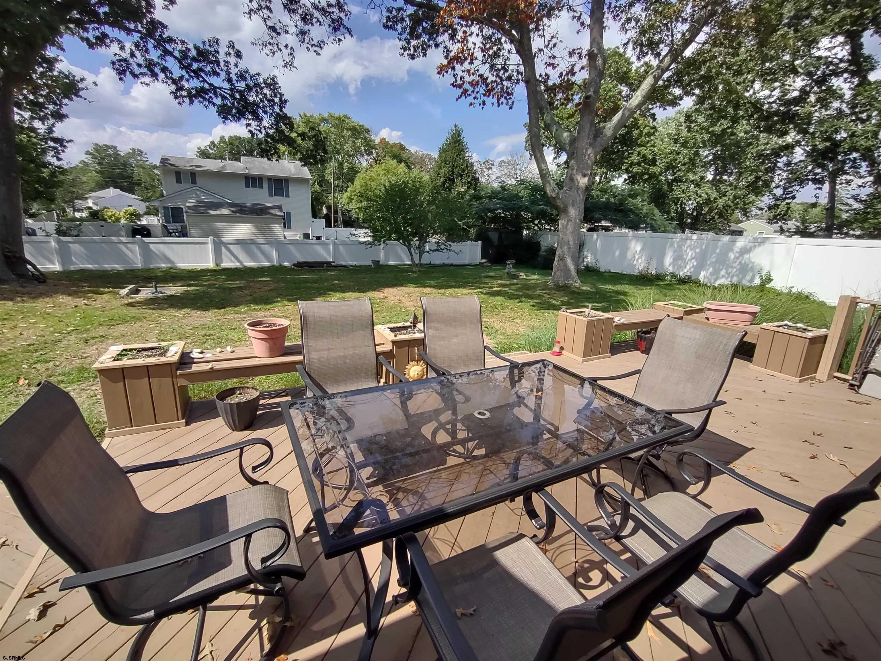 12 Osborne Road Somers Point, NJ 08244 - Photo 15 of 15 a view of a chairs and table on the terrace