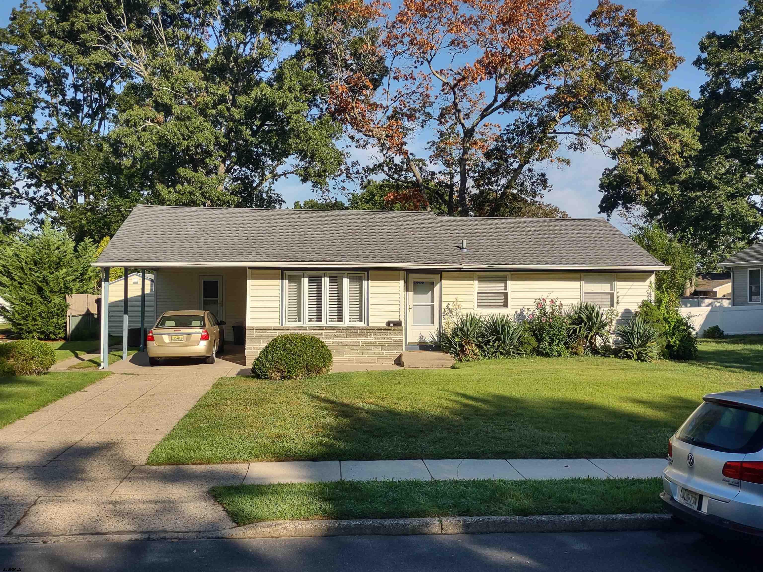 12 Osborne Road Somers Point, NJ 08244 - Photo 2 of 15 a front view of a house with a yard