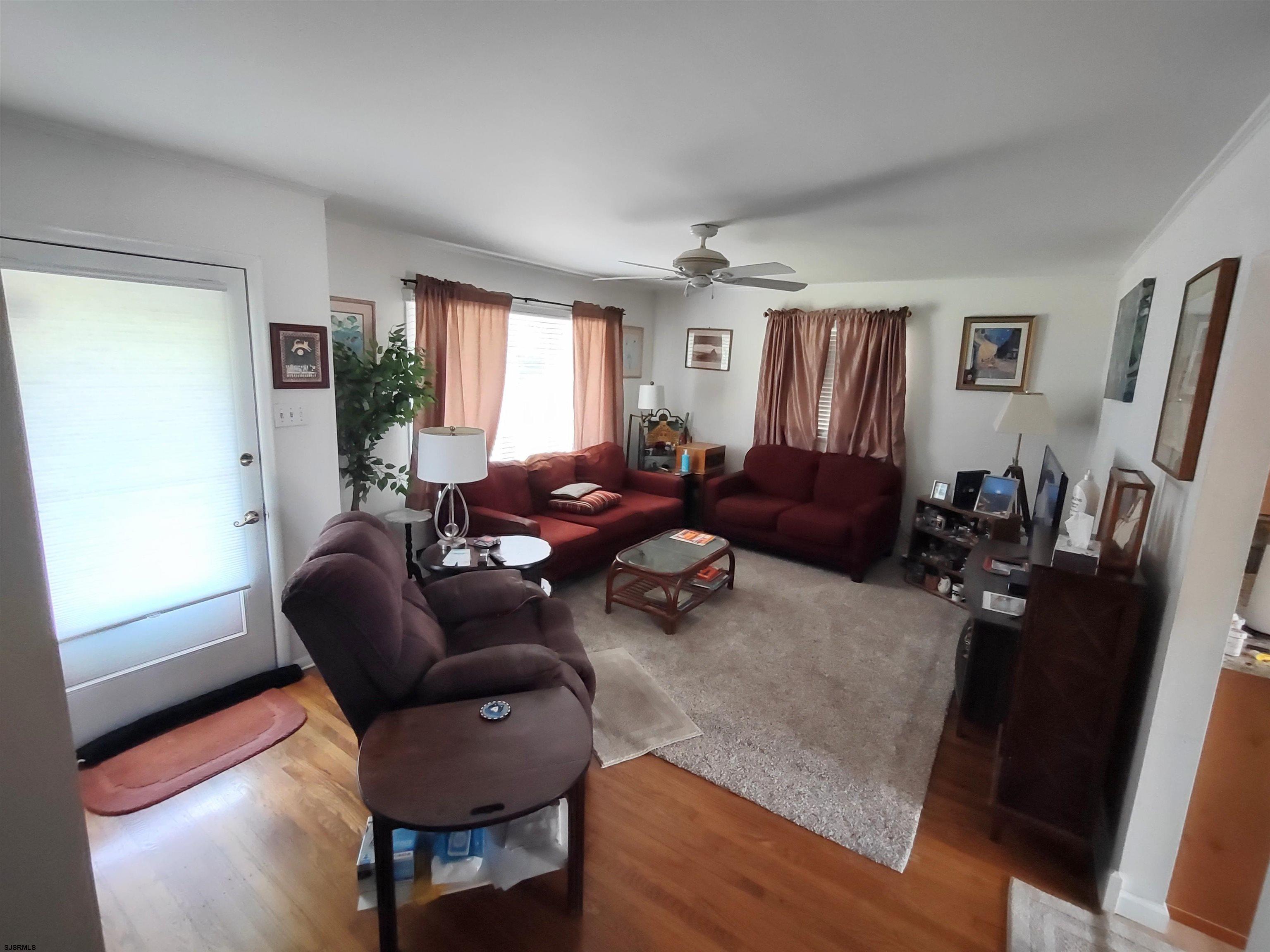 12 Osborne Road Somers Point, NJ 08244 - Photo 3 of 15 a living room with furniture and a window