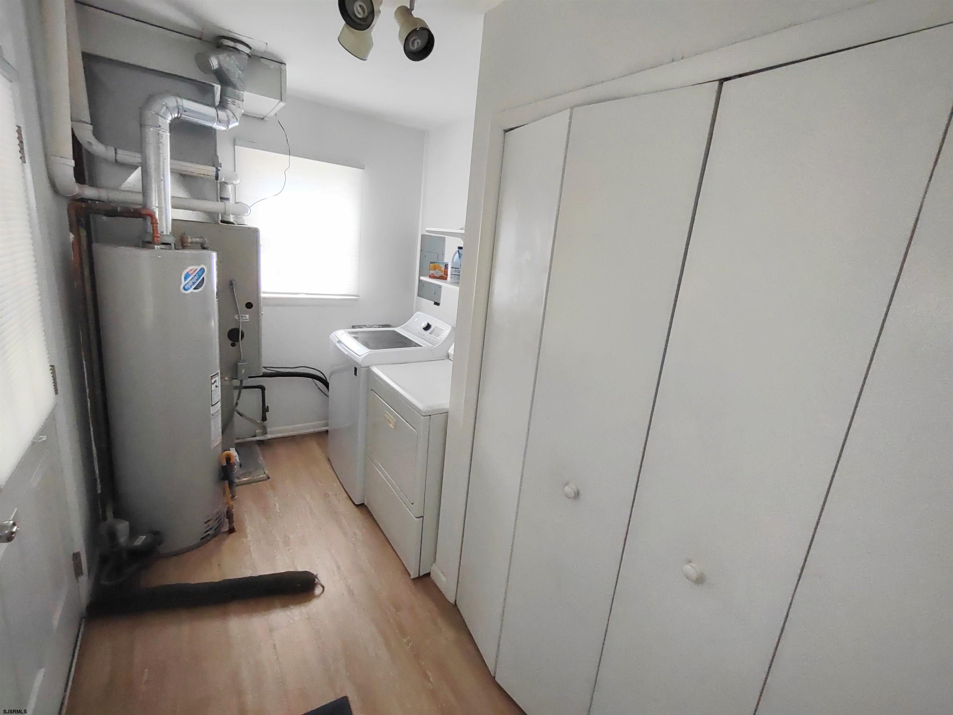 12 Osborne Road Somers Point, NJ 08244 - Photo 10 of 15 a view of a storage & utility room with closet window