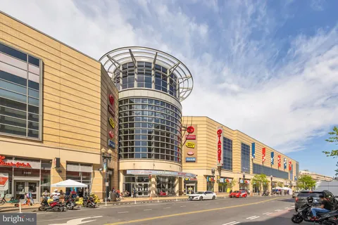 a front view of a building with a street