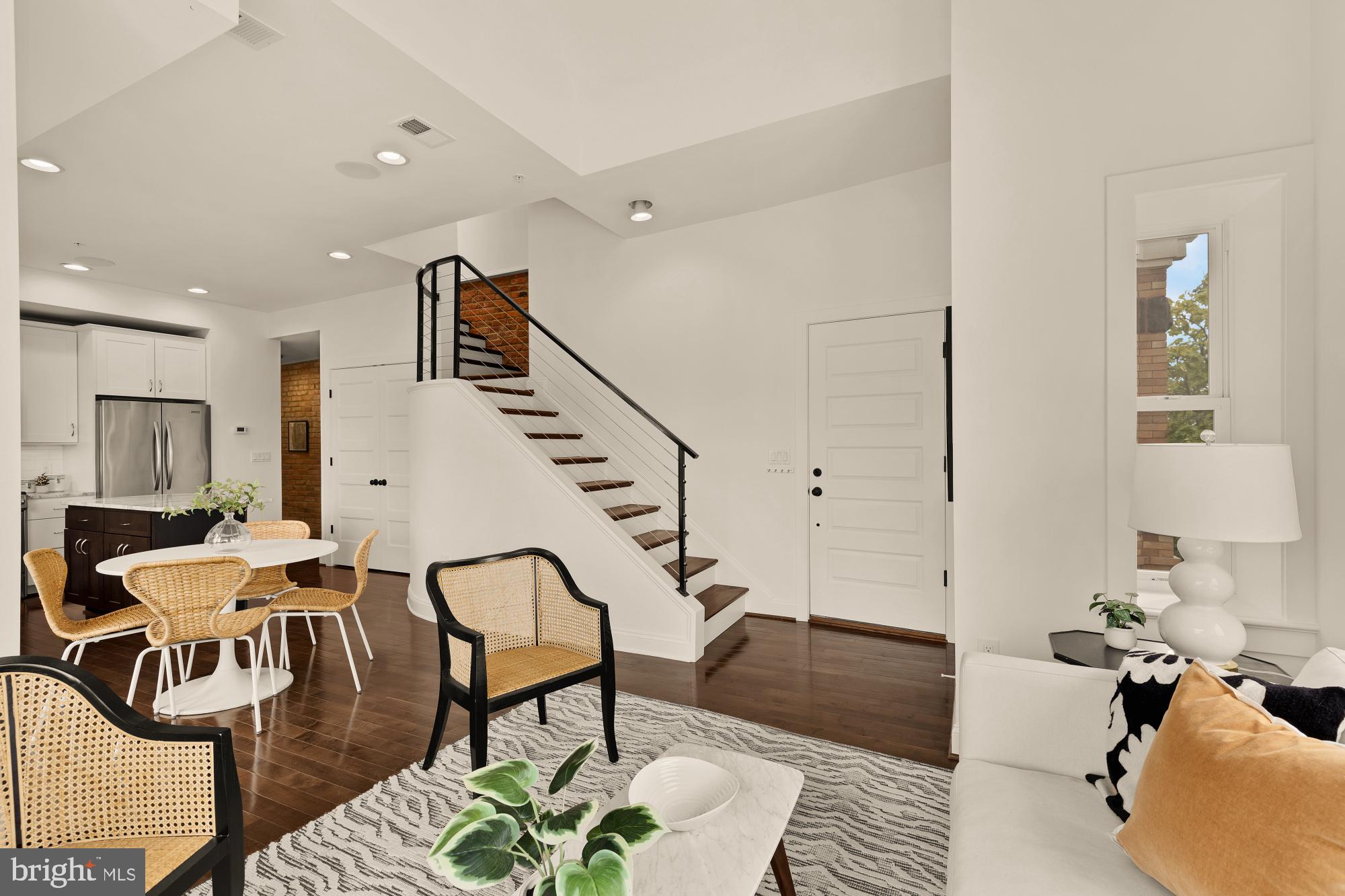 1249 Kenyon Street Northwest, Unit 4 Washington, DC 20010 - Photo 4 of 30 a living room with furniture