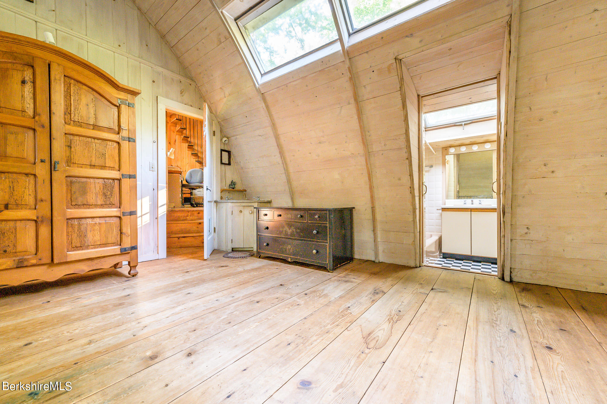 12 Austerlitz Road West Stockbridge, MA 01266 - Photo 17 of 46 a view of an empty room with wooden floor and a window