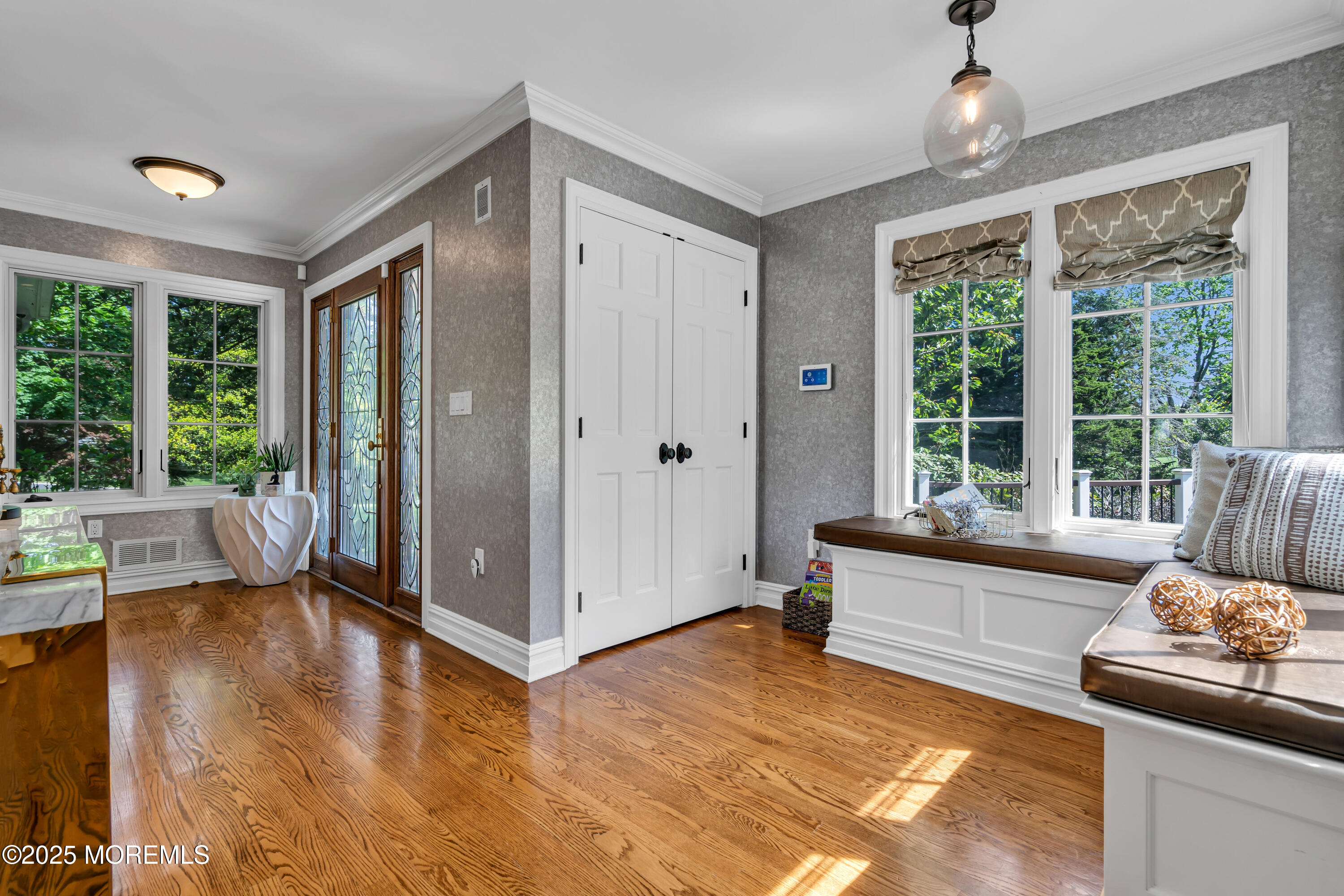 91 Ridge Road Rumson, NJ 07760 - Photo 11 of 80 a living room with furniture and a large window