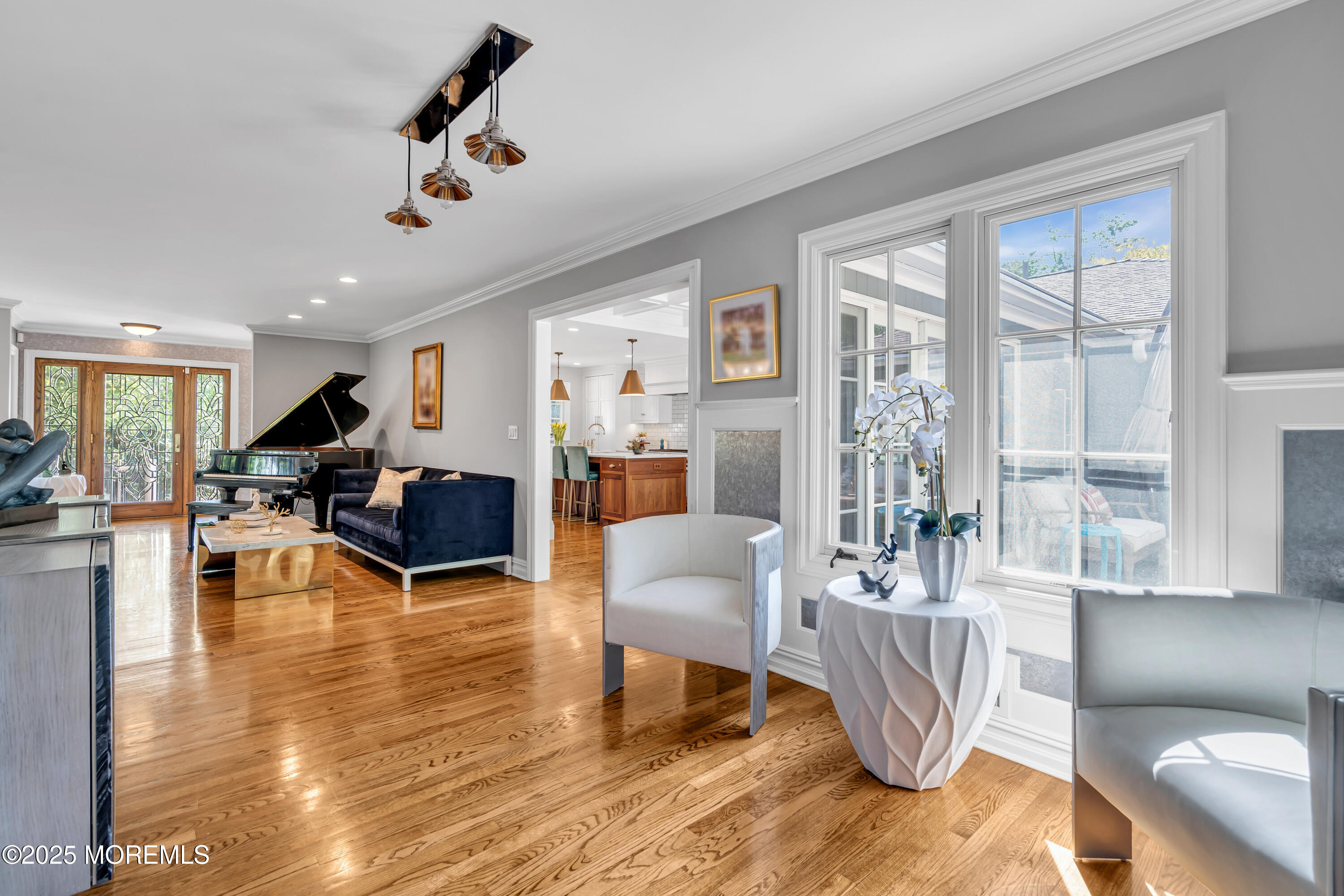 91 Ridge Road Rumson, NJ 07760 - Photo 16 of 80 a living room with furniture and a large window
