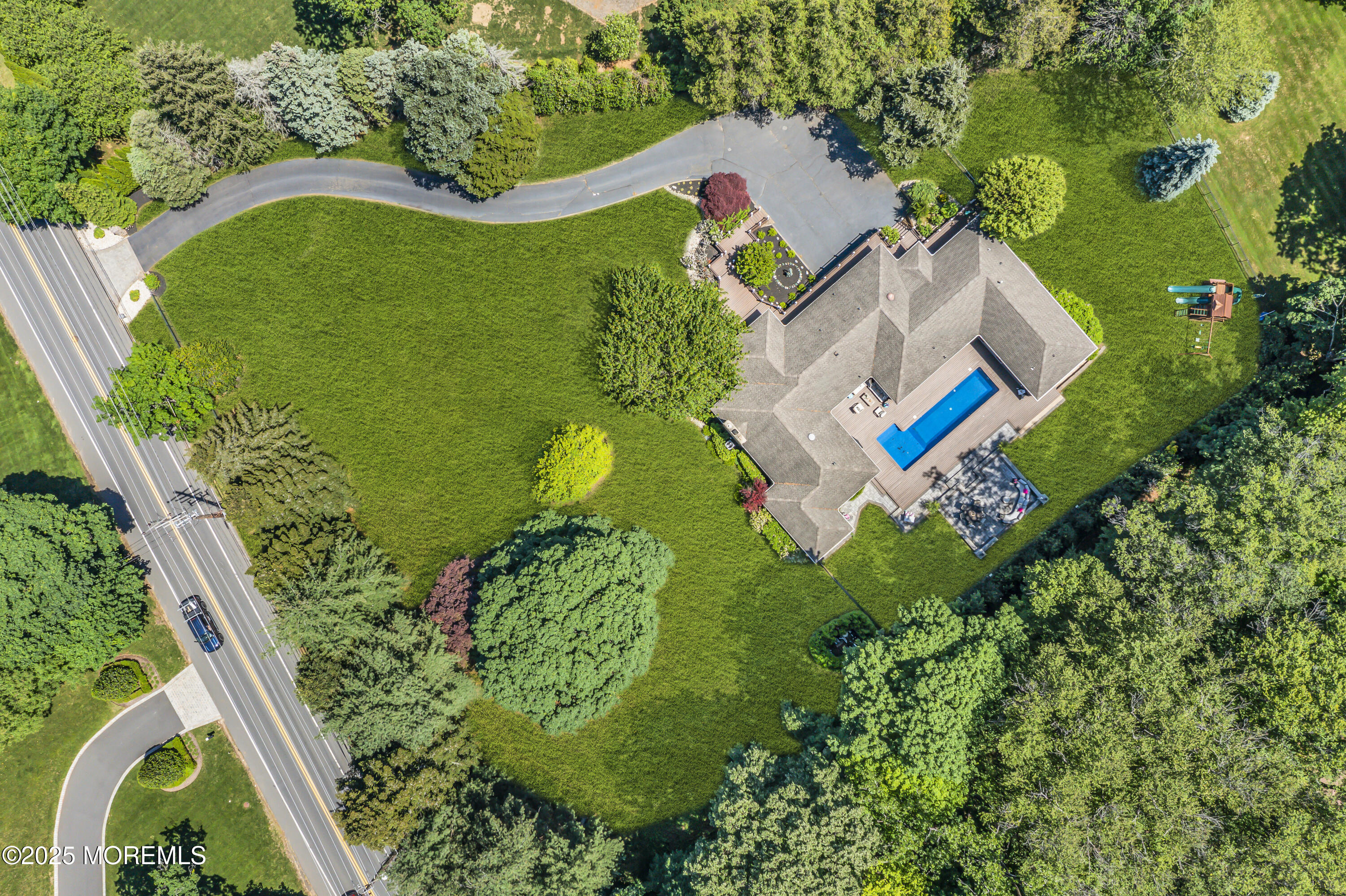 91 Ridge Road Rumson, NJ 07760 - Photo 2 of 80 an aerial view of a house