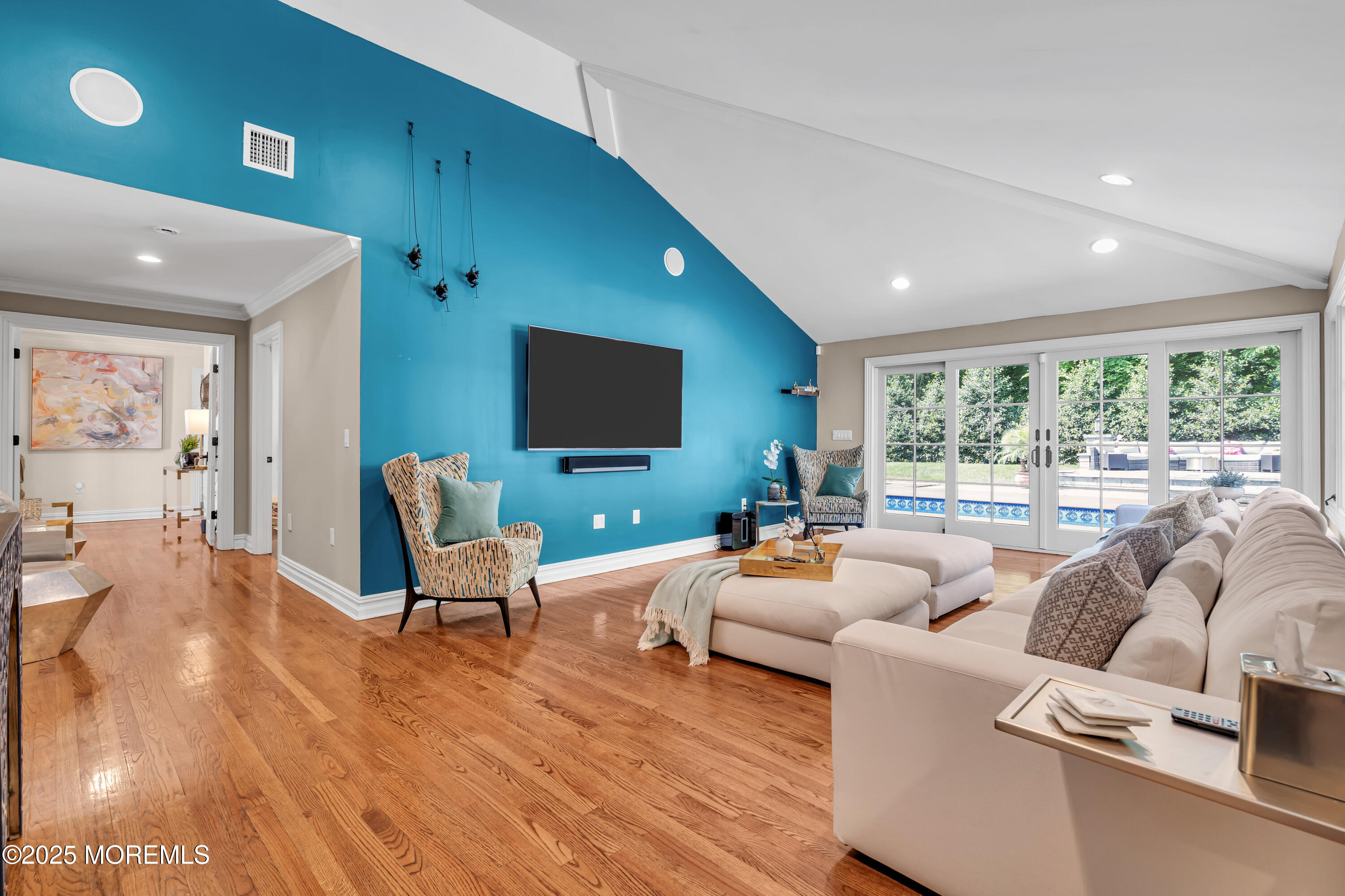 91 Ridge Road Rumson, NJ 07760 - Photo 26 of 80 a living room with furniture and a flat screen tv