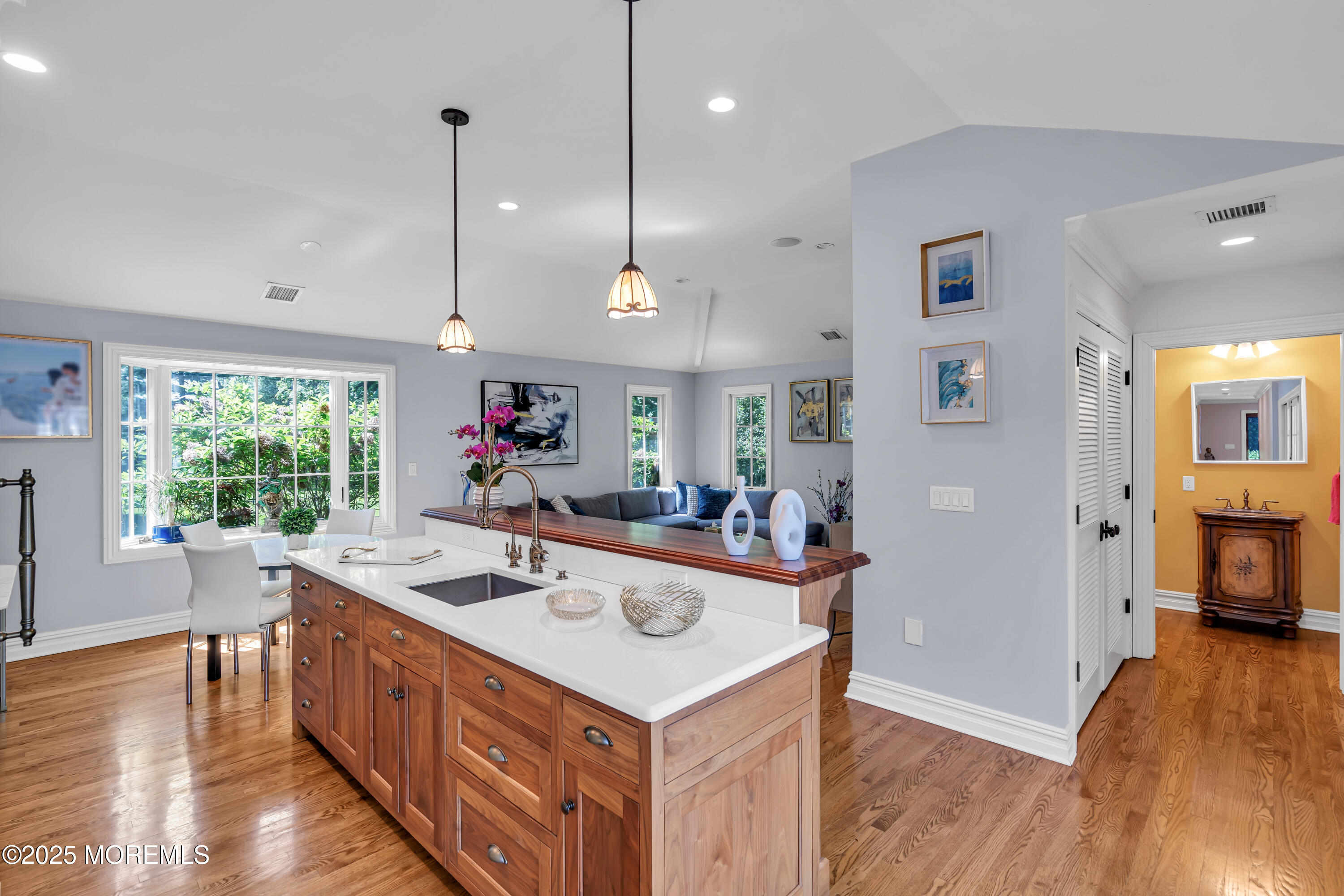 91 Ridge Road Rumson, NJ 07760 - Photo 32 of 80 a kitchen that has a lot of cabinets a sink and a wooden floor