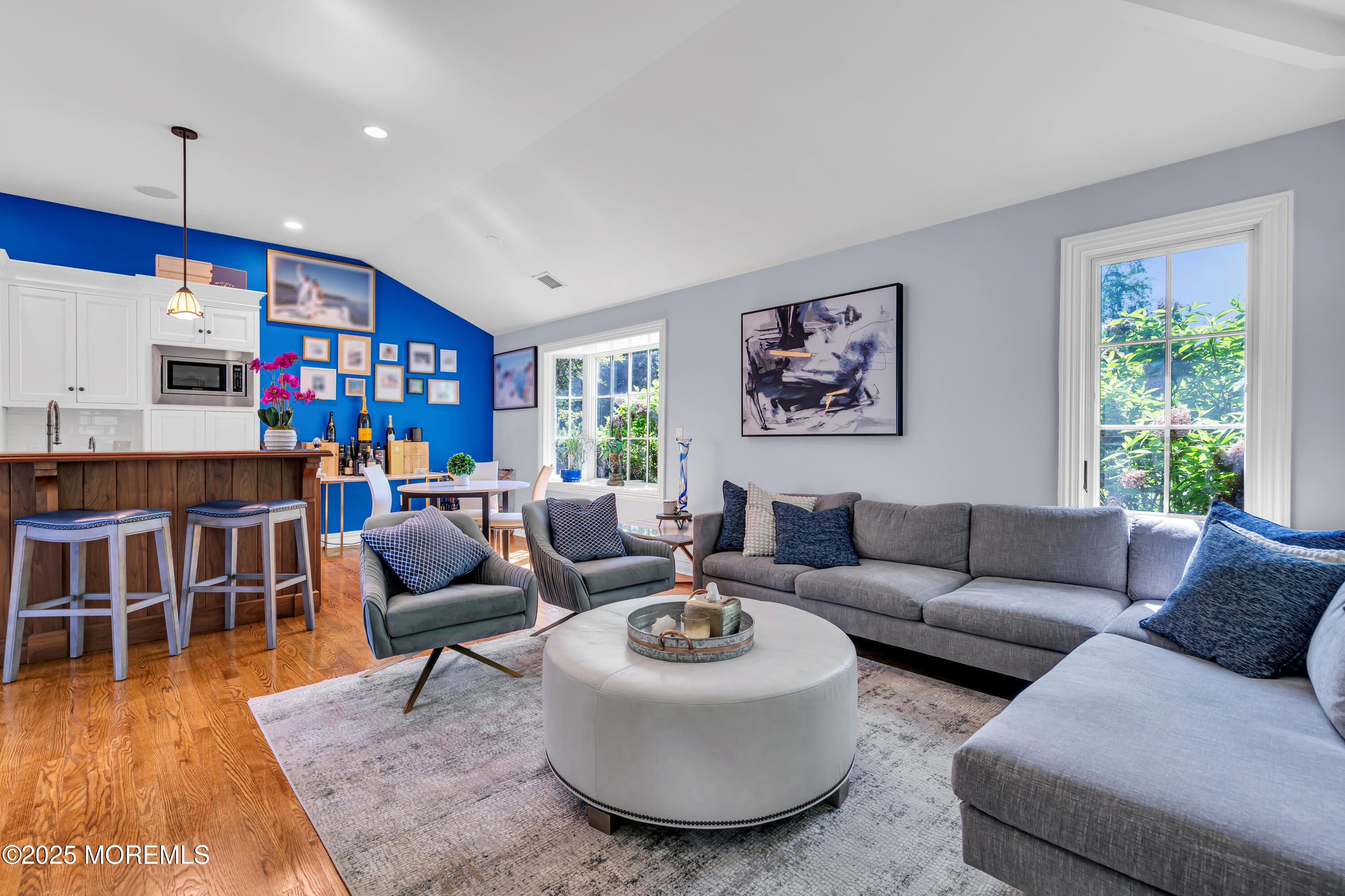 91 Ridge Road Rumson, NJ 07760 - Photo 34 of 80 a living room with furniture and a book shelf