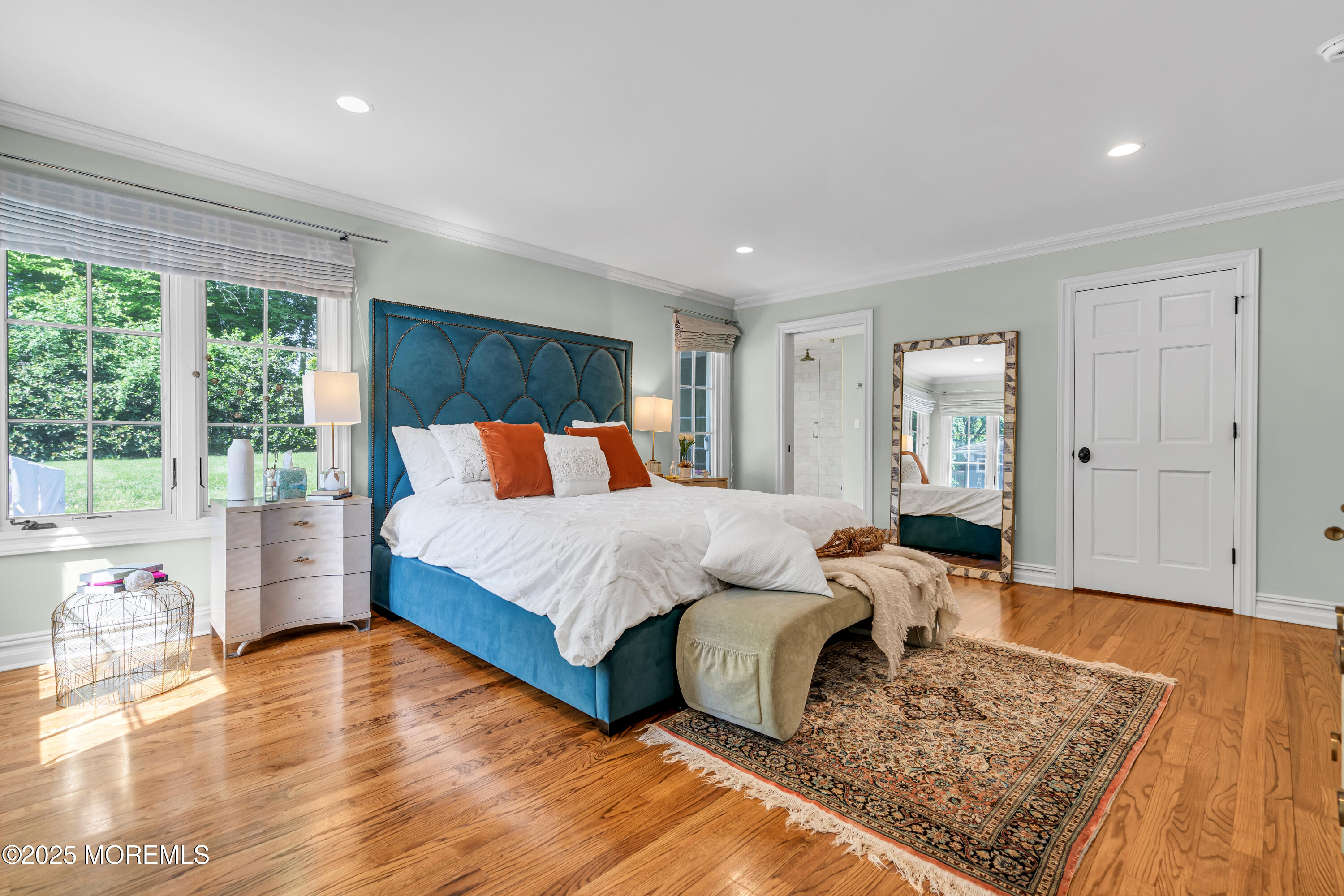 91 Ridge Road Rumson, NJ 07760 - Photo 37 of 80 a bedroom with a bed and wooden floor