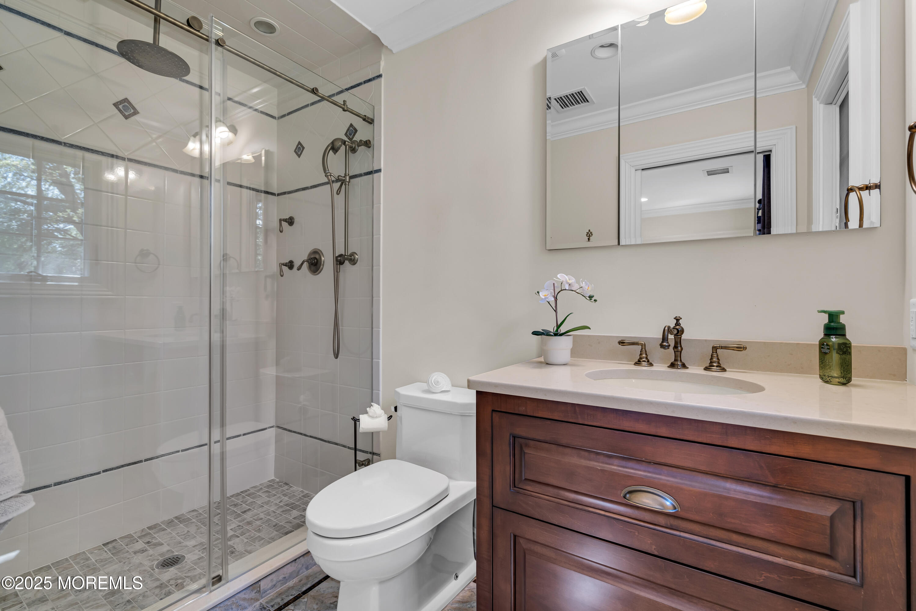 91 Ridge Road Rumson, NJ 07760 - Photo 51 of 80 a bathroom with a granite countertop toilet sink and shower