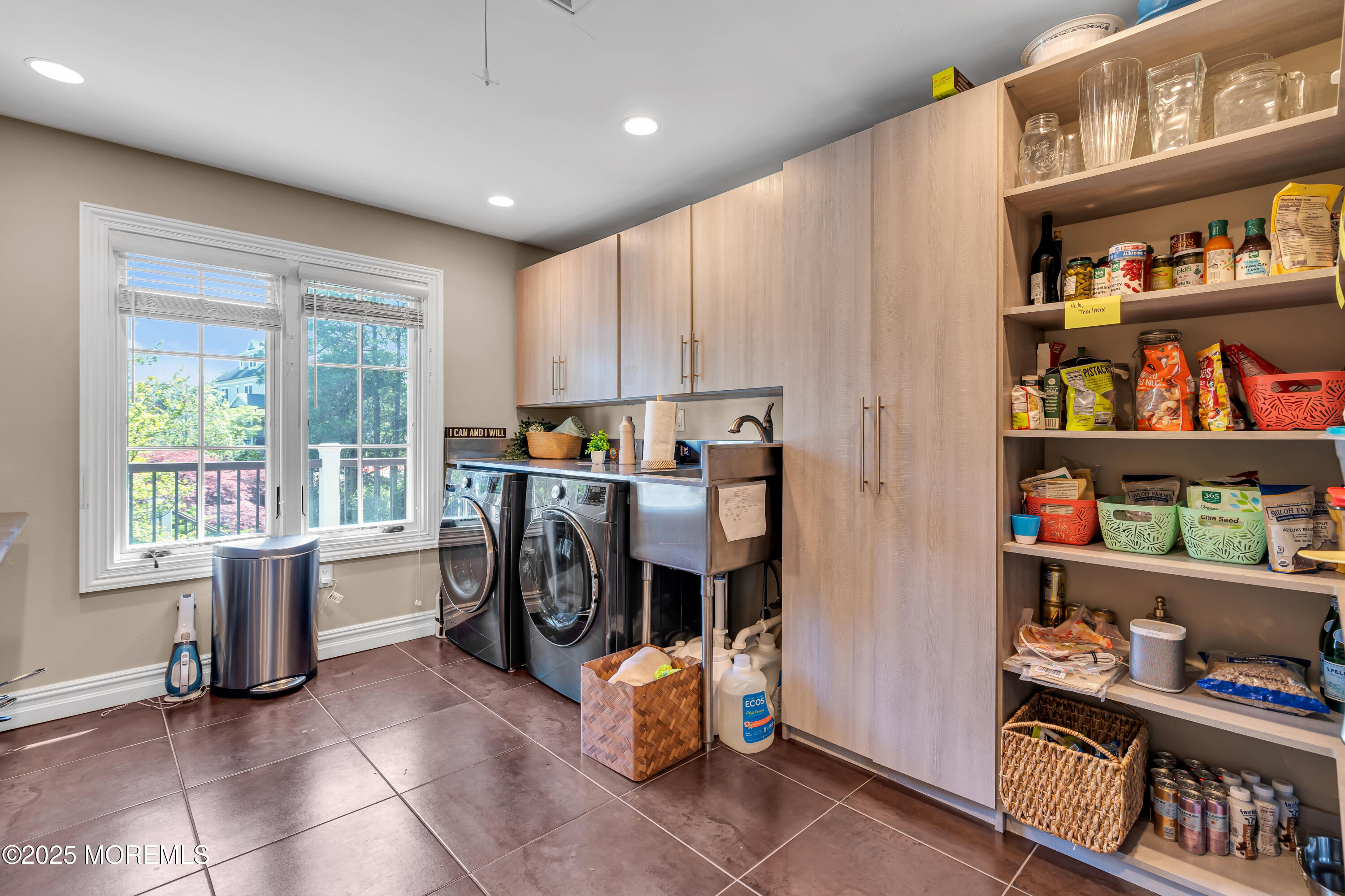 91 Ridge Road Rumson, NJ 07760 - Photo 53 of 80 a room with furniture and a book shelf