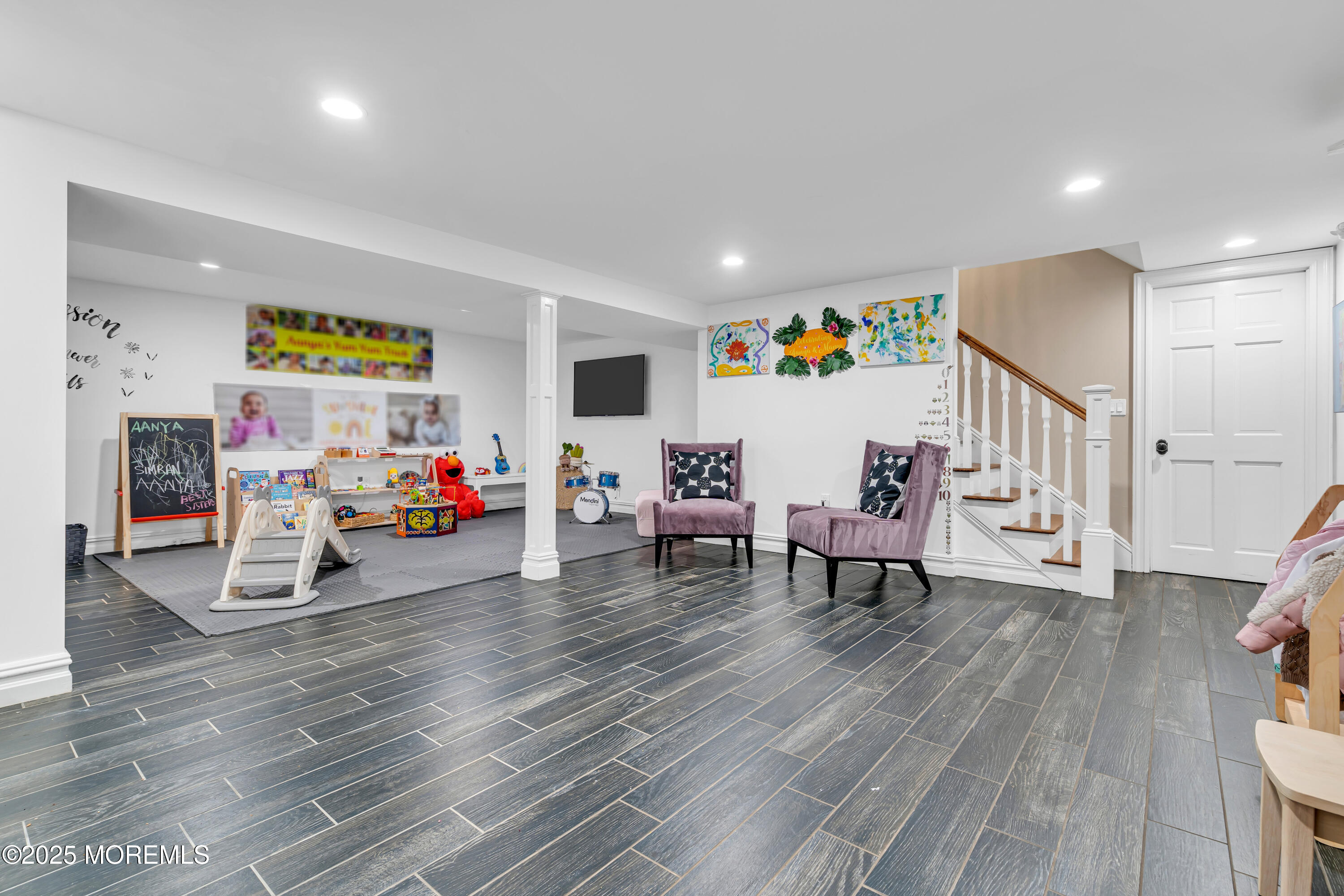 91 Ridge Road Rumson, NJ 07760 - Photo 58 of 80 a living room with furniture and a wooden floor