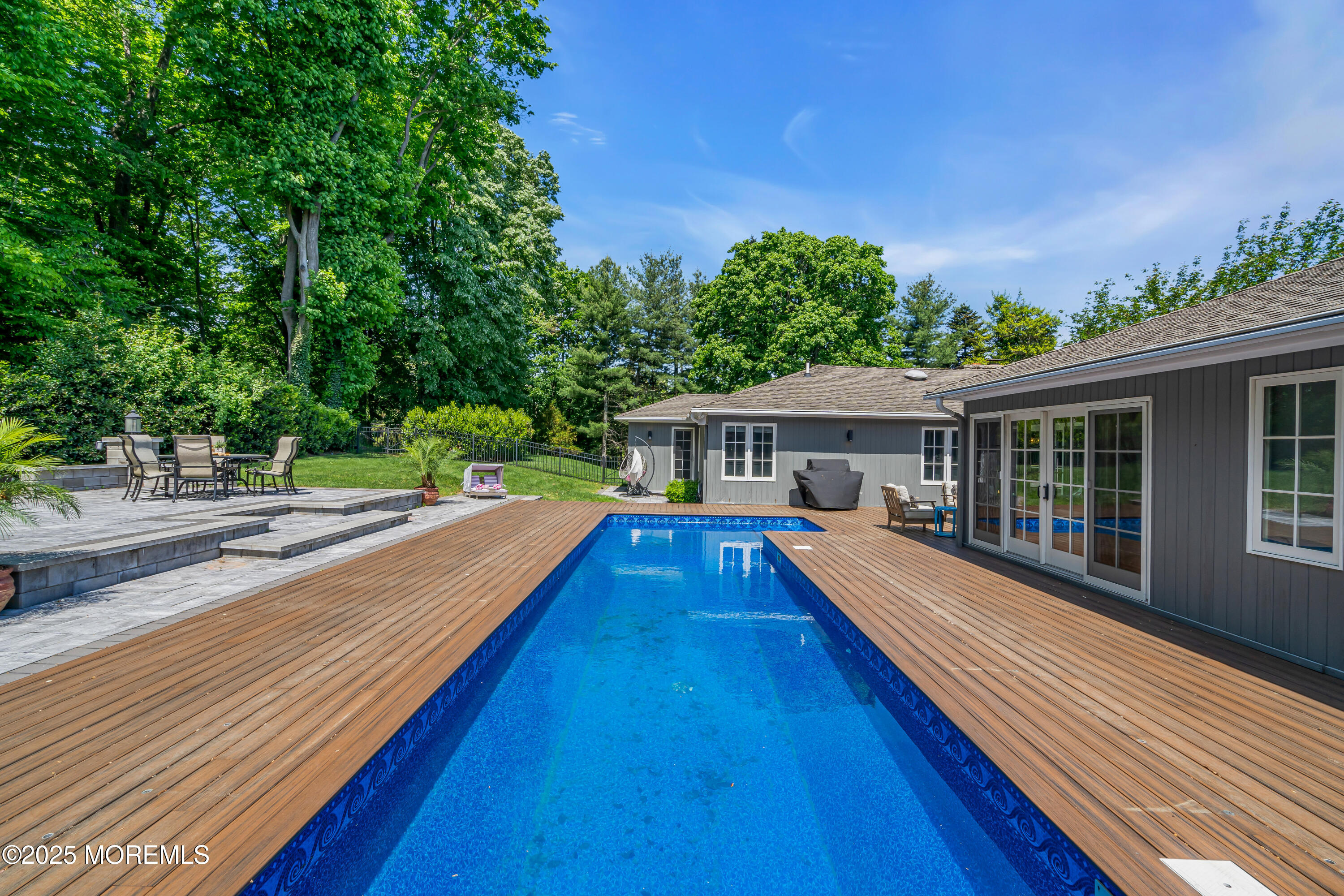 91 Ridge Road Rumson, NJ 07760 - Photo 64 of 80 a view of a house with pool and sitting area