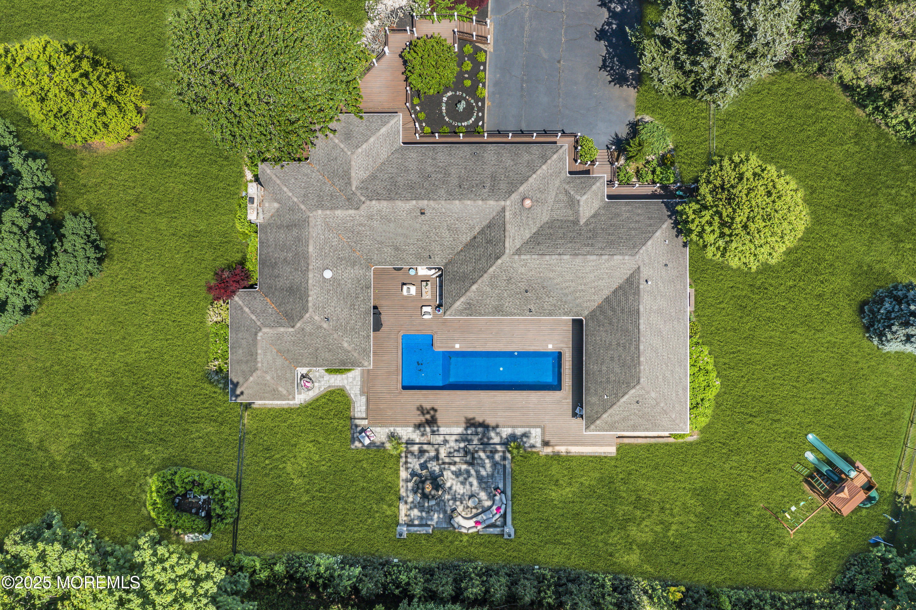 91 Ridge Road Rumson, NJ 07760 - Photo 68 of 80 an aerial view of a house with a yard basket ball court and outdoor seating