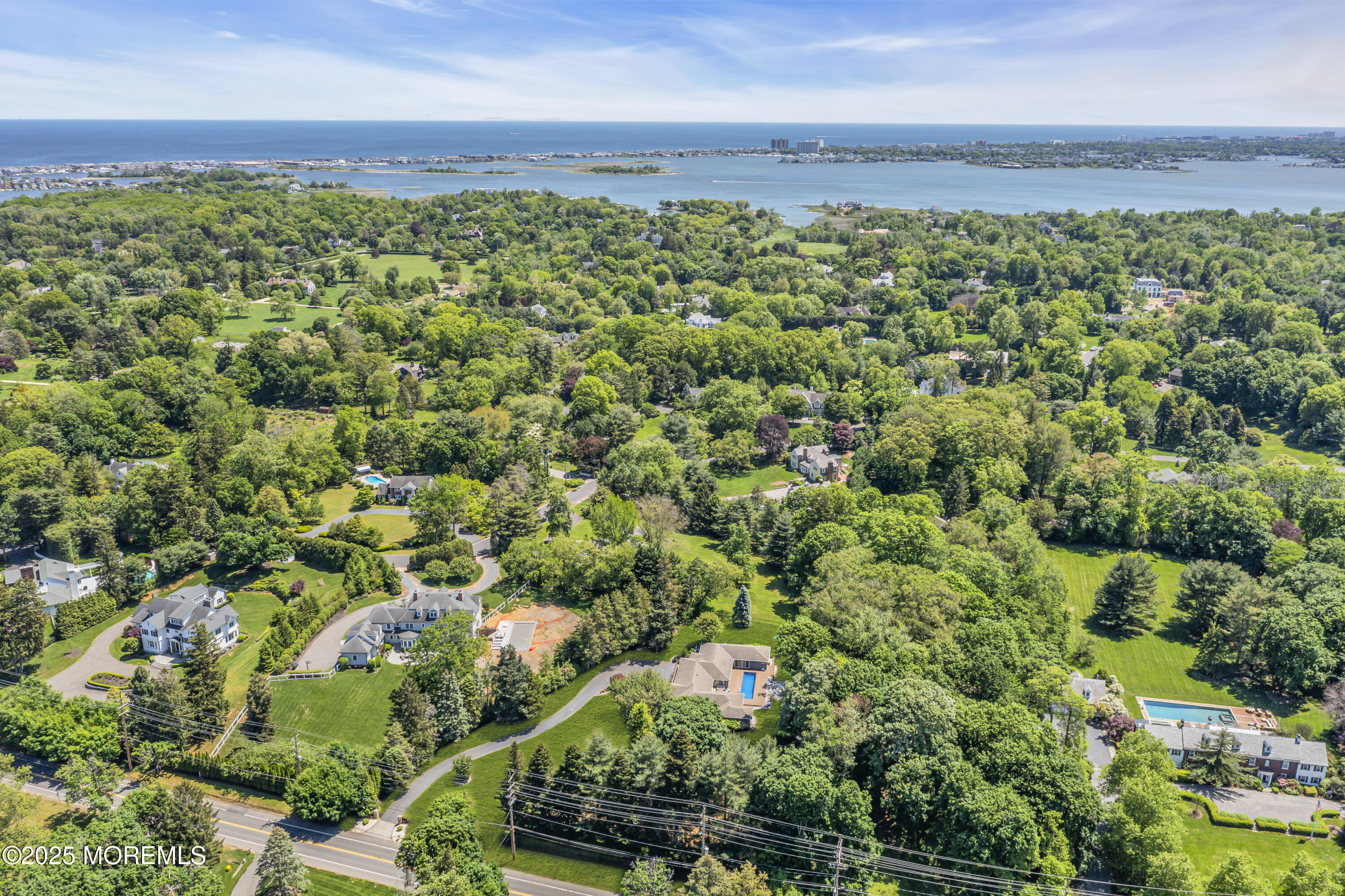 91 Ridge Road Rumson, NJ 07760 - Photo 75 of 80 a view of a garden with an outdoor space