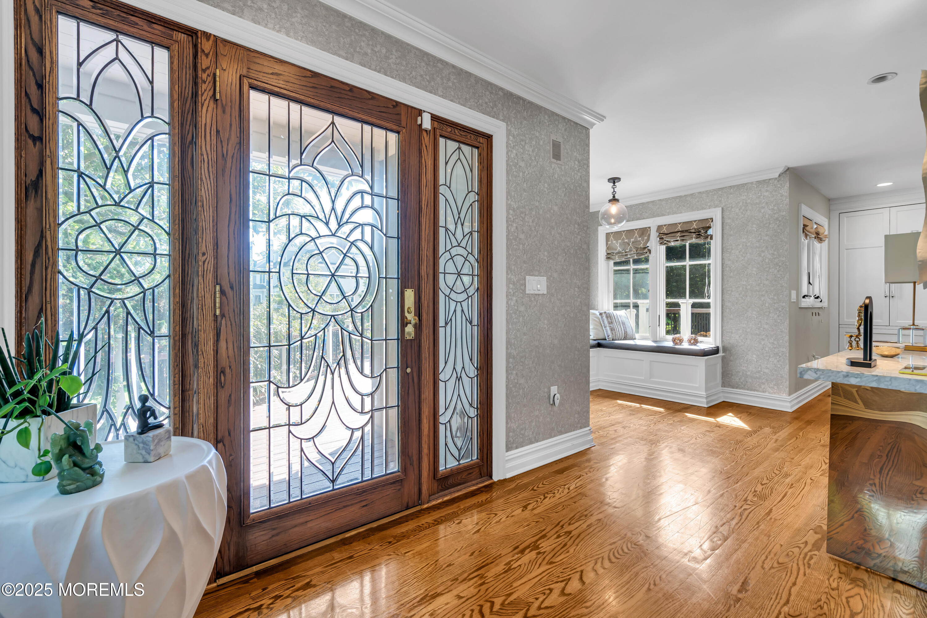 91 Ridge Road Rumson, NJ 07760 - Photo 10 of 80 a view of front door with furniture and a potted plant
