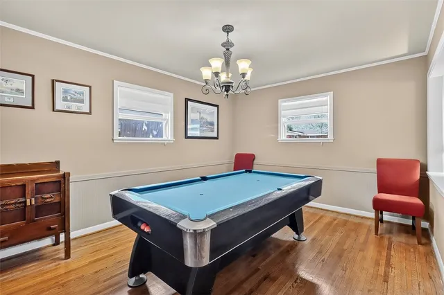 a room with furniture and wooden floor