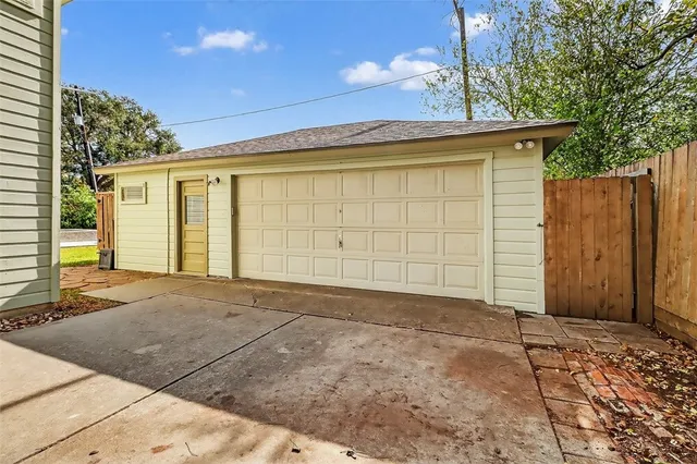 a view of walk in closet with clothes