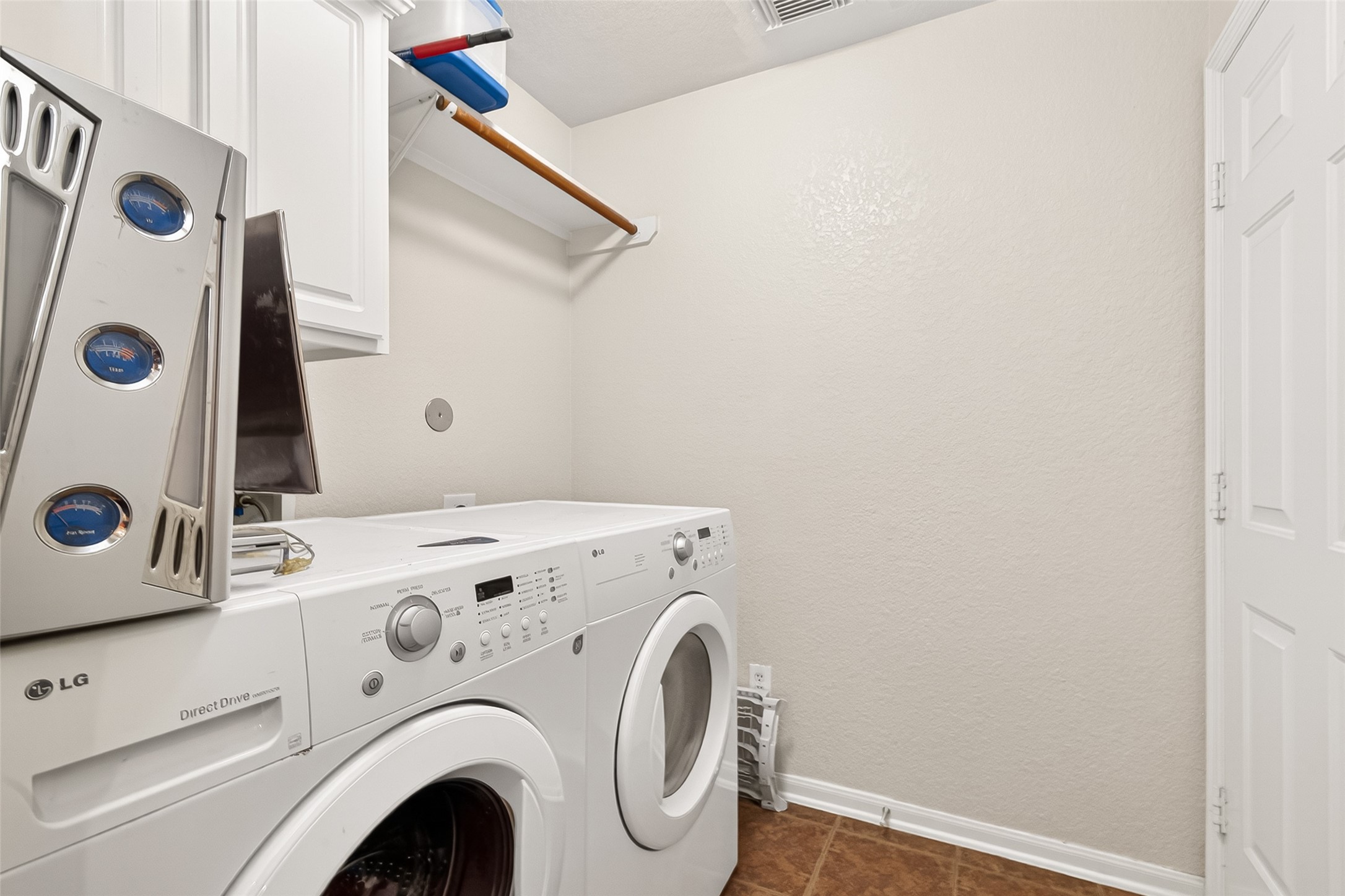 16715 Mackenzie Mesa Drive Spring, TX 77379 - Photo 31 of 50 a utility room with dryer and washer