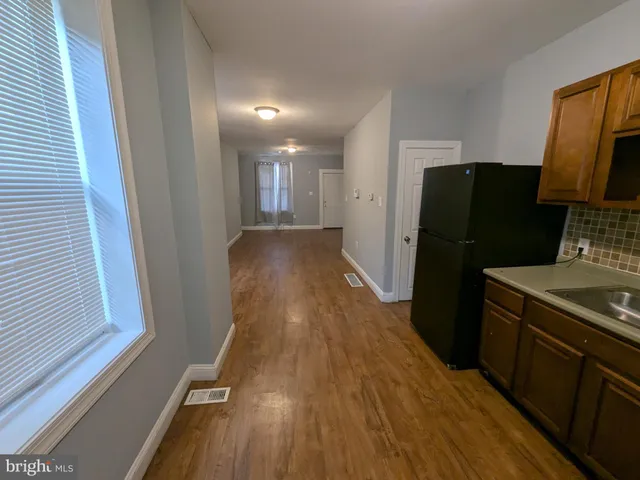 a bathroom with a bathtub and toilet
