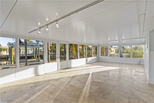 a large white building with a outdoor space