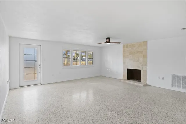 an empty room with windows