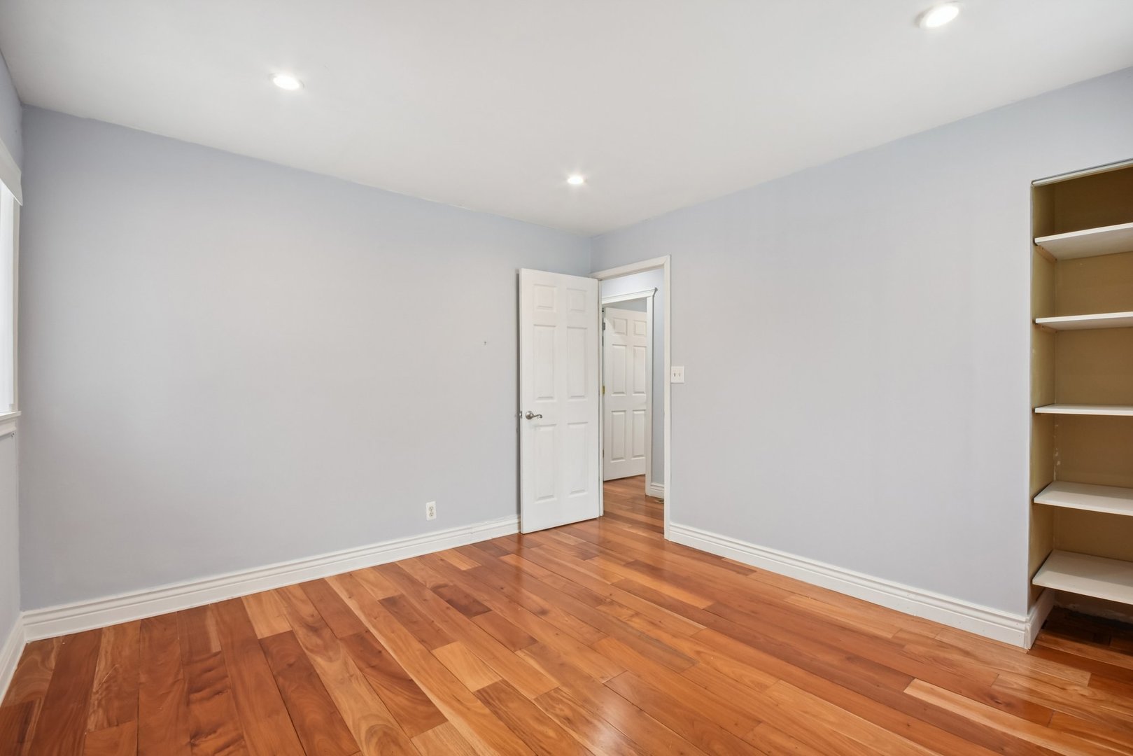 301 Villa Road Streamwood, IL 60107 - Photo 17 of 34 a view of empty room with wooden floor