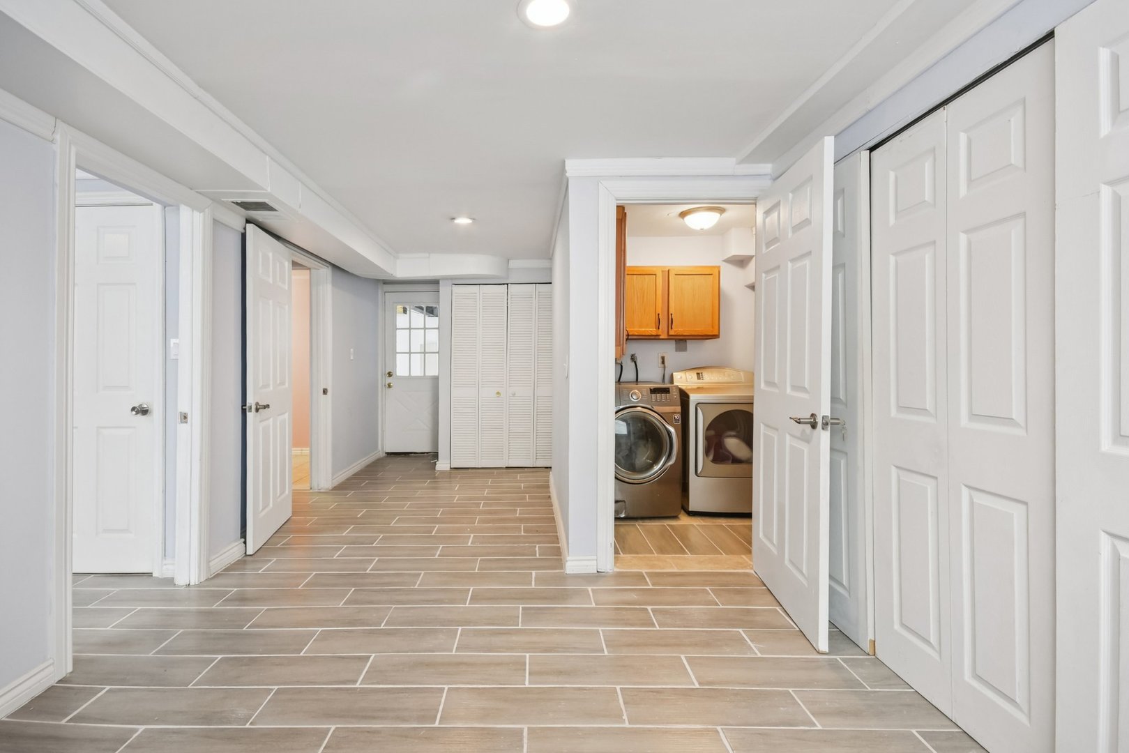 301 Villa Road Streamwood, IL 60107 - Photo 22 of 34 a view of a hallway with a livingroom and a fireplace