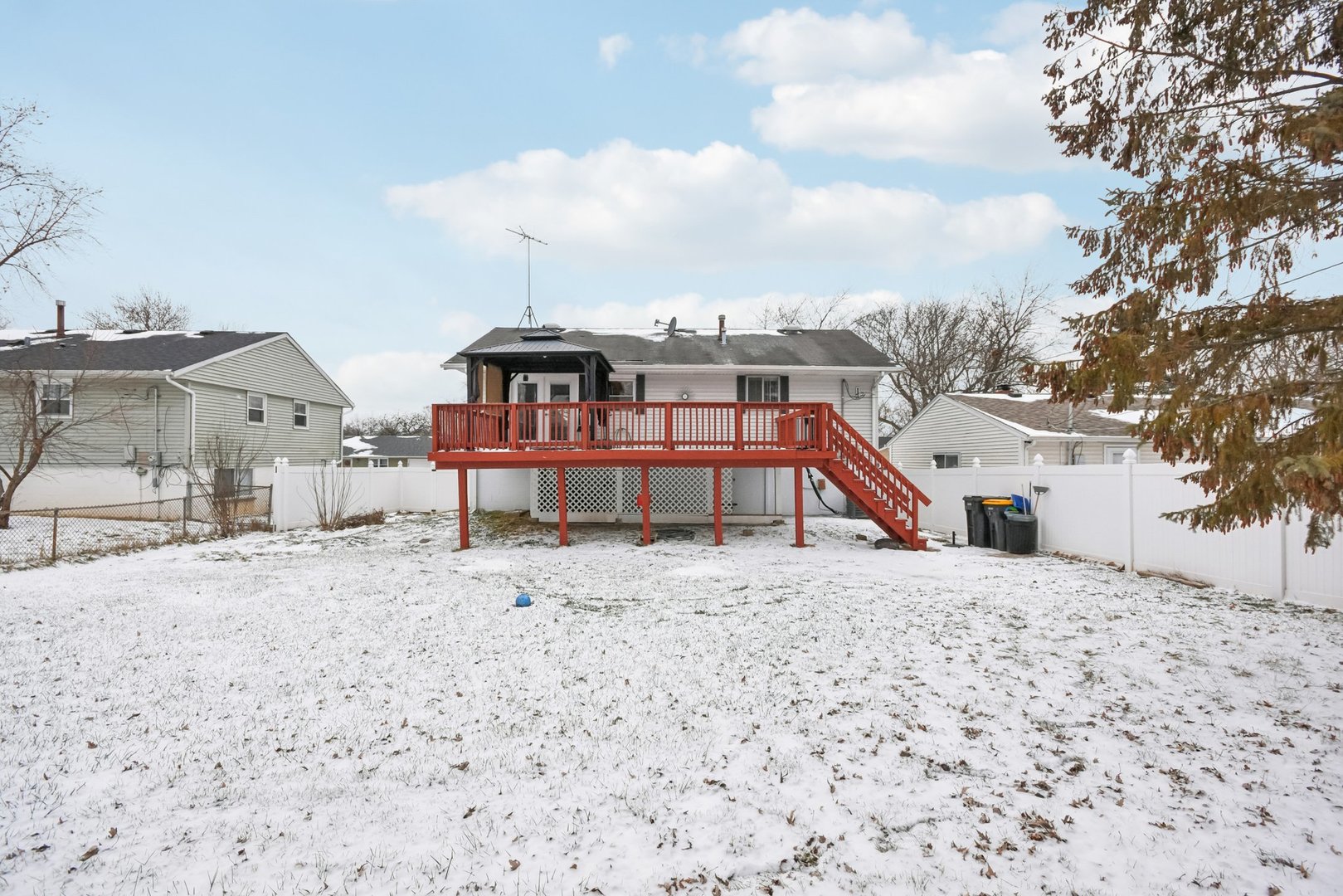 301 Villa Road Streamwood, IL 60107 - Photo 33 of 34 a view of a house with a snow in the background