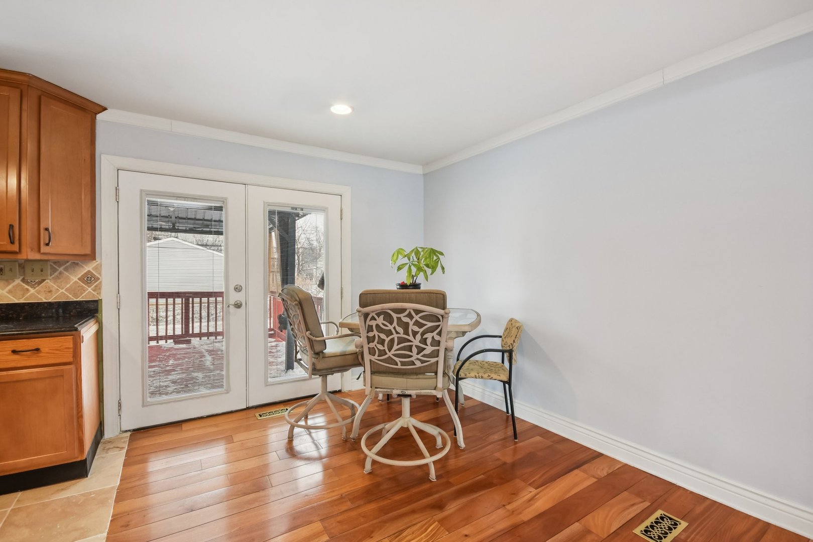 301 Villa Road Streamwood, IL 60107 - Photo 7 of 34 a view of a dining room with furniture and wooden floor