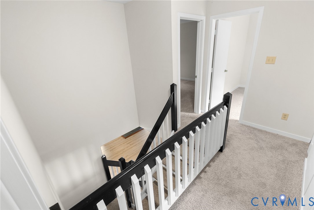 12916 Copperas Lane Henrico, VA 23233 - Photo 11 of 26 a view of a hallway with stairs