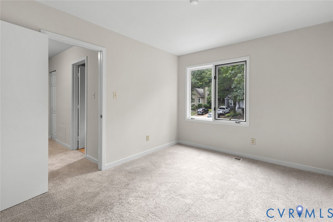 12916 Copperas Lane Henrico, VA 23233 - Photo 12 of 26 a view of an empty room with a window