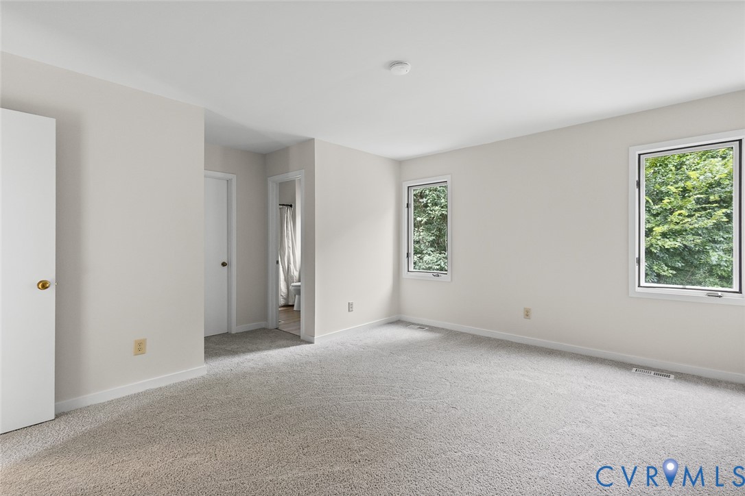 12916 Copperas Lane Henrico, VA 23233 - Photo 13 of 26 an empty room with windows